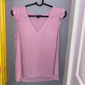 a J.Crew sheer purple/pink blouse with ruffles